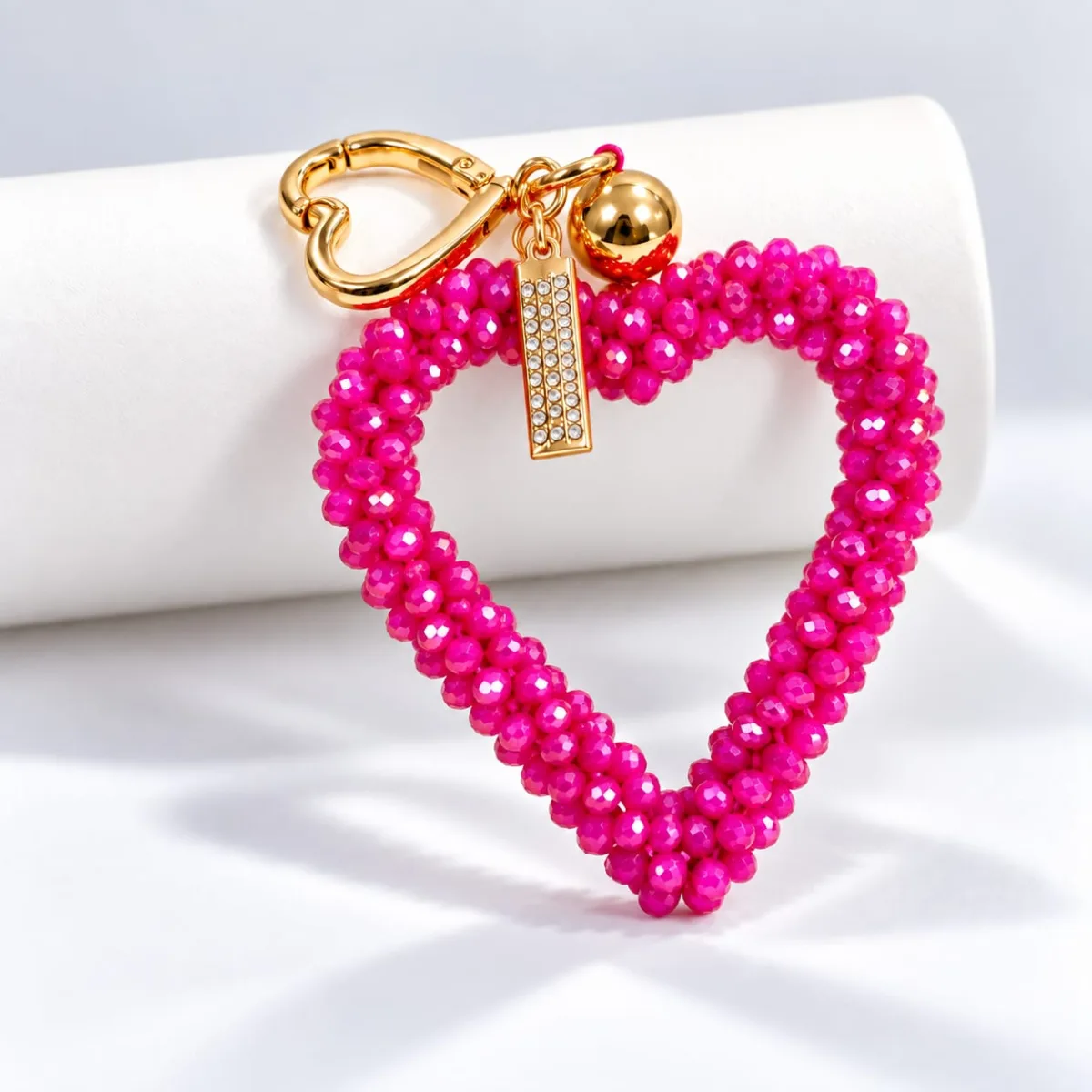 Porta Celular Corazón de Cristal Fucsia