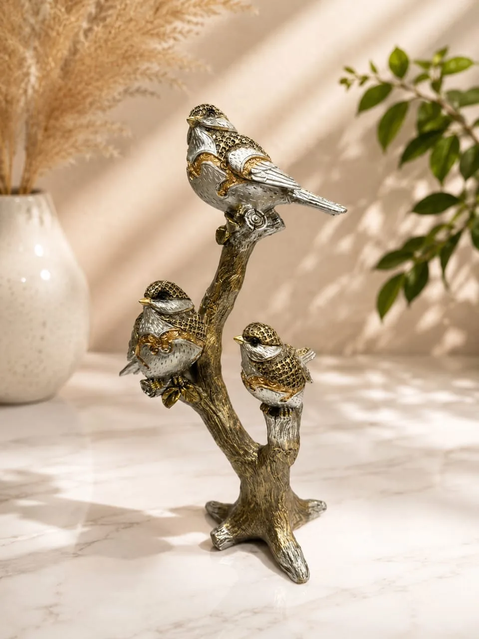 Figuras de Pájaros en Rama