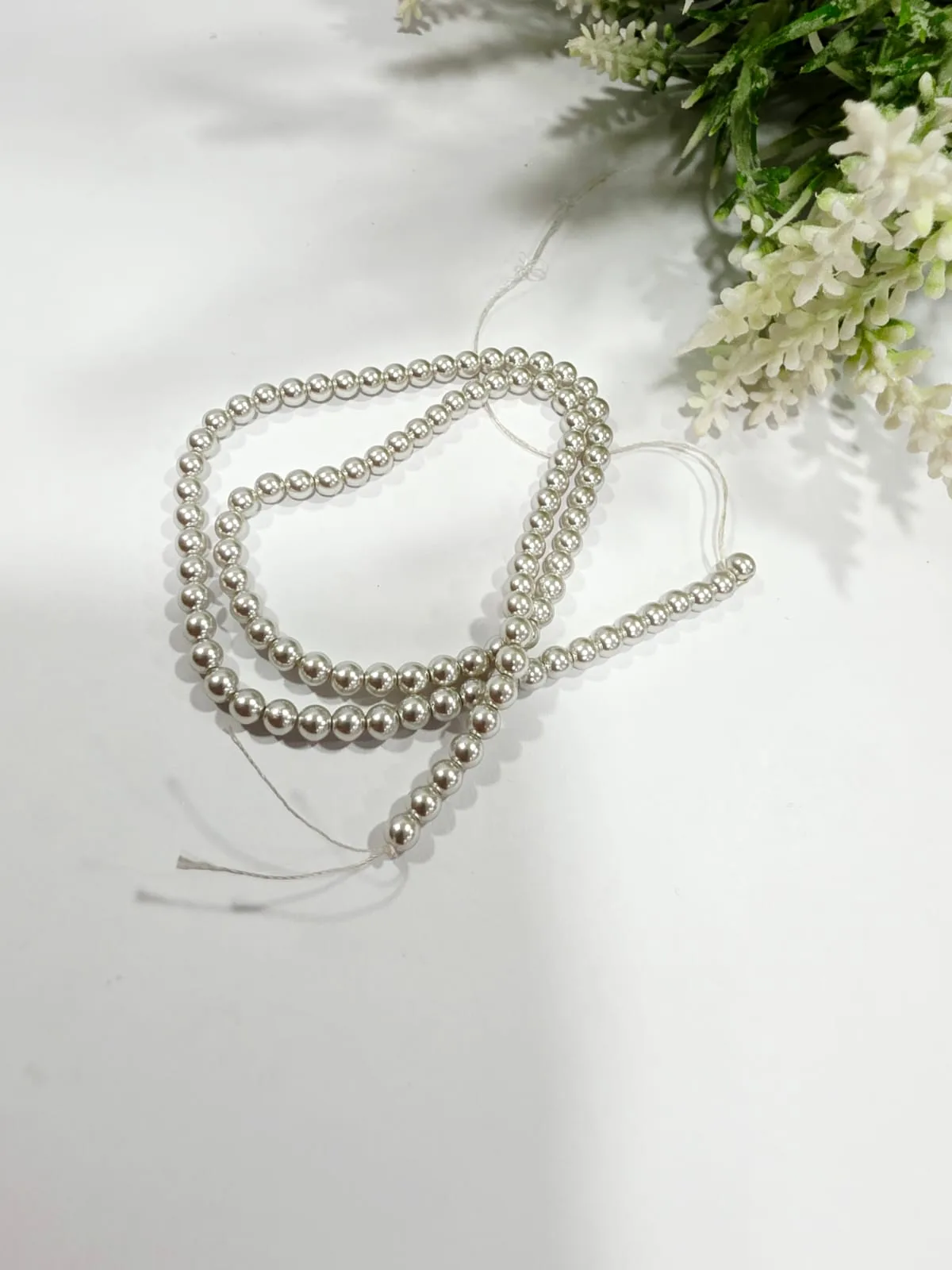 Perlas Shell 4mm Plateada