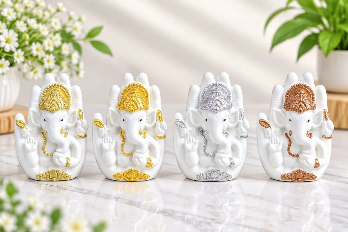 Figura de Ganesh en Mano Blanca con Detalle de Color