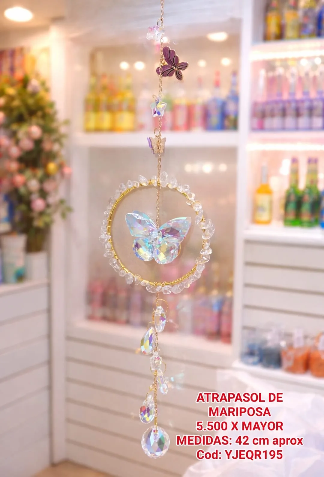 Atrapasoles Aro de Cuarzo Blanco con Mariposa de Cristal Iridiscente