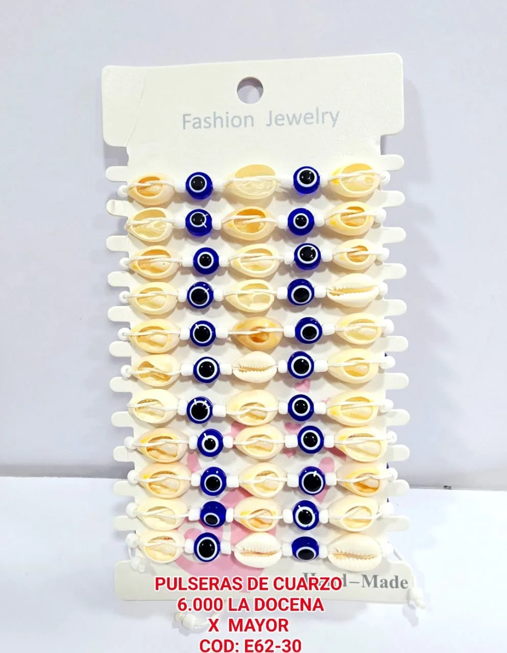 Pack 12 Pulsera Veraniega Protectora con Conchas Cauri y Abalorios de Ojo Turco Azul