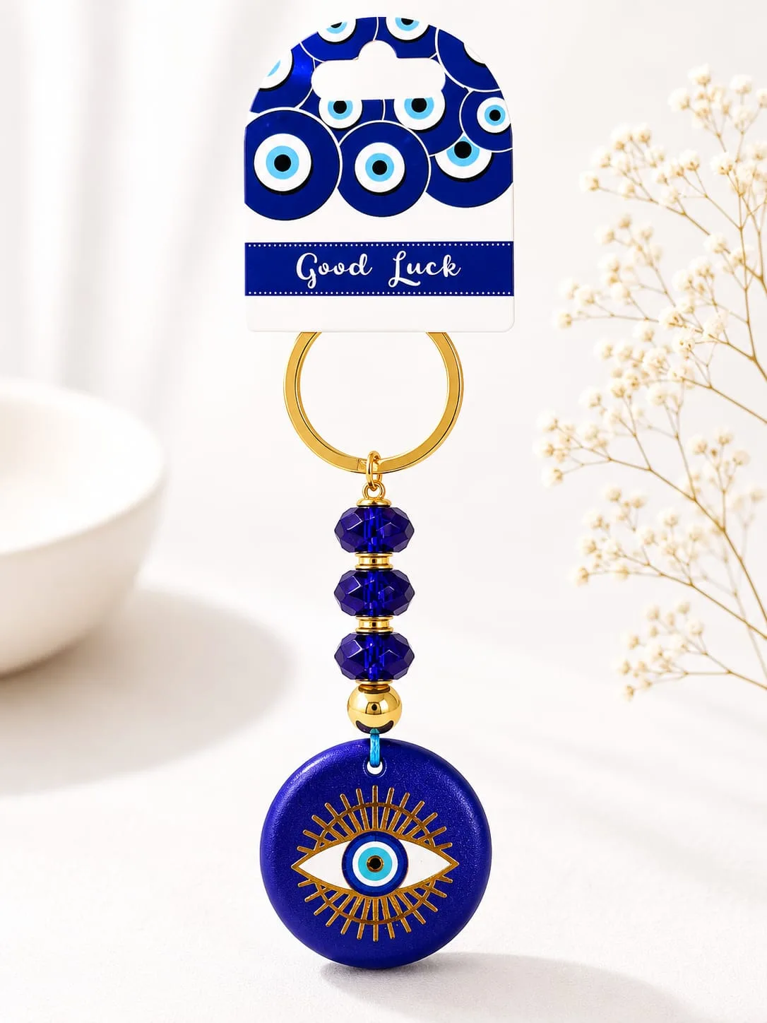 Llavero Dorado de Ojo Turco - Ojo Estilizado Dorado Sobre Fondo Azul