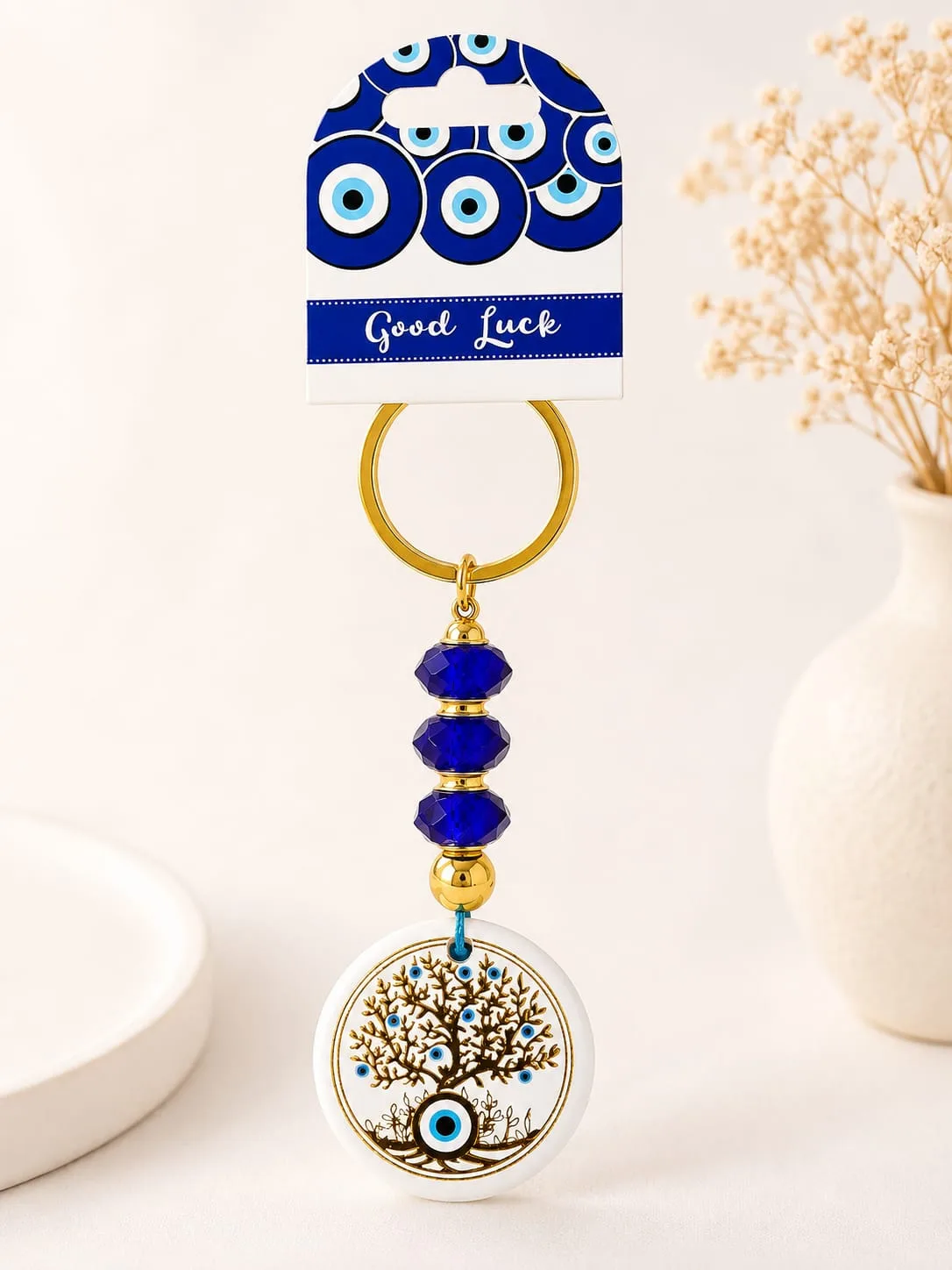 Llavero Dorado de Ojo Turco - Árbol de la Vida Dorado Sobre Fondo Blanco