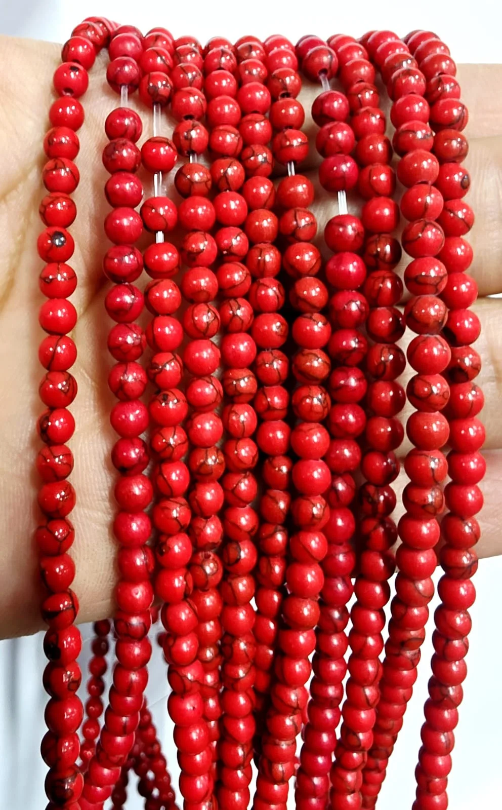 Tira de piedras de Howlita Roja N°4