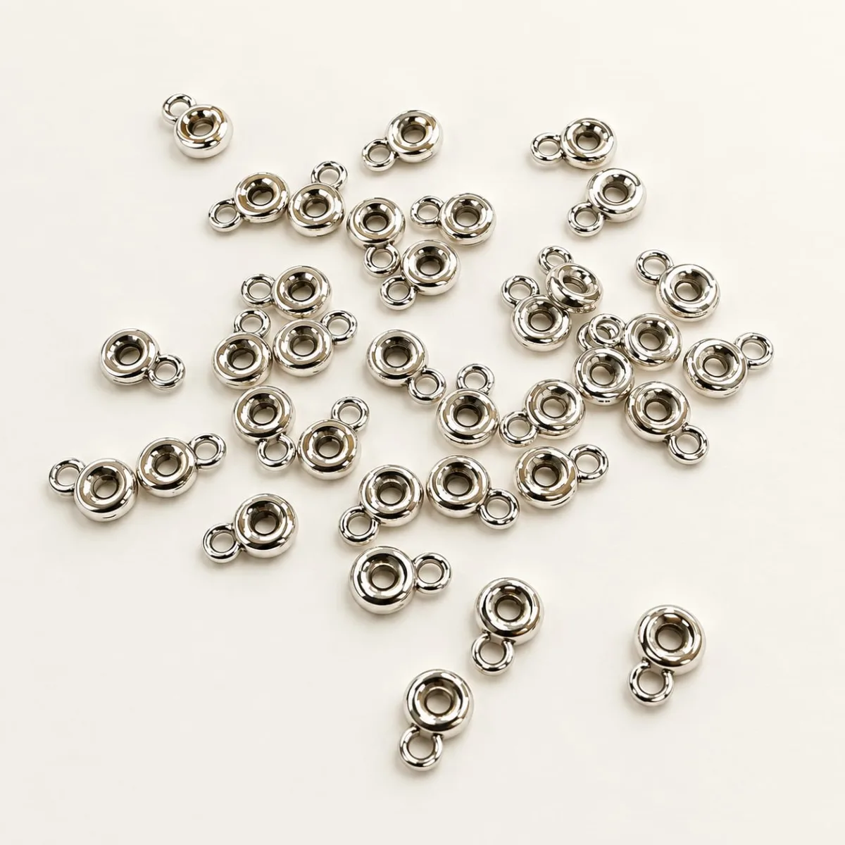 Separador Metálico con Argolla Liso Pequeño 6mm