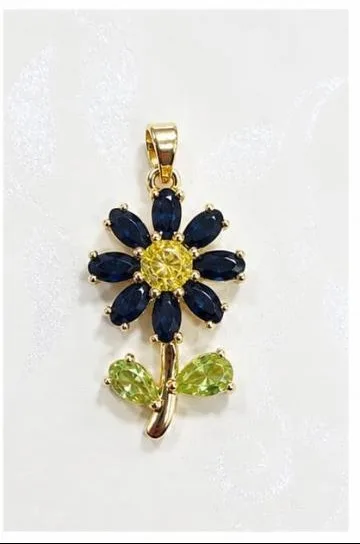 Colgante de Rodio - Flor pétalos azul marino centro amarillo